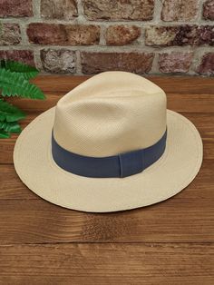 Handmade Panama Hat and Removeable ~ Grey ~ Accessory Band The band is interchangeable and can be removed to reveal a plain dark band underneath (dark band fixed to hat). The removeable band is elasticated and will stretch for different size hats. ~ Genuine Panama hat handwoven with Toquilla palm ~ ~ Handwoven in Ecuador ~ ~ Natural Panama ~ ~ Possible to roll for easy travel ~ ~ Inside comfort band ~ Other colour Panama hats and bands available from our store > https://www.etsy.com/shop/persona Short Brim Toquilla Straw Panama Hat, Toquilla Straw Panama Hat With Short Brim, Classic Adjustable Natural Hat Bands, Adjustable Classic Natural Hat Bands, Beige Adjustable Fit Hat With Short Brim, Beige Hats With Adjustable Fit And Short Brim, Beige Hat With Adjustable Fit And Short Brim, Adjustable Brimmed Panama Hat In Solid Color, Adjustable Solid Color Brimmed Panama Hat