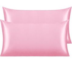 two pink pillow cases on a white background