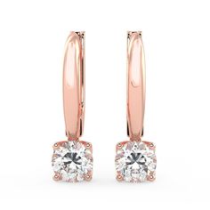 Twinkling and moving with you, these solitaire earrings dangle and dance from French wires that drop below your earlobes. Brilliant lab-grown diamonds catch the light from every angle. The perfect timeless silhouette if you prefer a wire to a post, these classic earrings are so comfortable you may forget you have them on. [split] Metal: 14K Rose Gold Lab-Grown Diamonds:  Color -- J or Higher Clarity -- SI1 or Higher All Stones Above 0.30 Ct. Are IGI Certified Oval Necklace, Solitaire Earrings, Classic Earrings, Wedding Jewelry Earrings, French Wire, Three Stone Rings, Rose Earrings, Rose Gold Earrings, Earrings Dangle