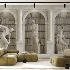 a living room filled with furniture and bookshelves covered in white marble statues on the walls