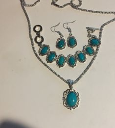 Turquoise or Red  Turquoise  Silver Oval Pendant Shaped Pendant Necklace , Bracelet and Earrings Set ! Silver necklace is 20" and has an extender ! Bracelet has a Lobster Claw Clasp  Closure and is adjustable 7 Pendant is almost 1 3/4" high including the Bale and 1 " Wide Earrings are 1 1/2" with the Hook. The Bracelet has a Toggle Closure and 8" and adjustable to make smaller Your Choice Of Blue , Blue green turquoise or Red BLUE GREEN TURQUOISE PENDANT IS 1 1/2" INCLUDING THE BALE, 20" NECKLACE + 2" EXTENSION / EARRINGS HANG1 1/2" LONG / BRACELET GOES FROM 6 1/4" - 7 " This will come in a gift box ! Please feel free to ask any questions as I do not accept returns but contact me if there is a problem ! Thank You for stopping by Turquoise Jewelry Set, Long Bracelet, Blue Green Turquoise, Oval Necklace, Red Turquoise, Red Blue Green, Oval Pendant, Turquoise Pendant, Green Turquoise