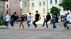 a group of young men jumping in the air