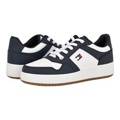 Offering a perfect combination of comfort, style, and durability, the Tommy Hilfiger® Krane sneakers are an ideal footwear choice for different occasions. The lace-up closure of these shoes offers a secure fit. These sneaker shoes feature a cushioned construction that makes them comfortable to wear all day. From your casual styles to fashion outfits, these sneakers work with most styles and looks. Faux leather or textile upper. Memory foam cushioned insole and polyester lining. Low-top silhouette. Flat heel design. Brand logo on the upper. Round toe. Synthetic rubber outsole. Imported. Product measurements were taken using size 7, width D - Medium. Please note that measurements may vary by size. Measurements: Weight: 1 lb STOCK IMAGES: actual item may look a bit different. Order half a siz Shoe Image, Hilfiger Shoes, Tommy Hilfiger Shoes, Casual Styles, Sneakers Athletic, Tommy Hilfiger Man, Designer Heels, Lifestyle Brand, Sneakers White