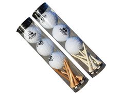 four golf balls and tees in a clear tube