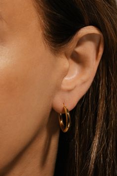 If you're looking for the perfect staple hoop earring, then you've found it with the Ravello Hoop. Inspired by the town of Ravello that's famous for its spectacular views of the Amalfi Coast, these earrings don't need much to take your breath away. Sold as a pair. Crafted with 18K triple-layered gold over brass; enhanced with a fourth-layer PVD coating. Closure: latch back Finish: high polish  DAILY CARE Keep your hoops in their best condition by removing them before exercising or showering. It August Birthstone Jewelry, July Birthstone Jewelry, The Amalfi Coast, Funky Jewelry, Jewelry Ring Box, Gifts For New Mums, Men's Jewelry Rings, Pearl Jewellery Earrings, Evil Eye Jewelry