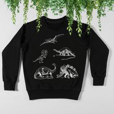 Like my designs but looking for something new? Message me to create a custom creation! Otherwise... enjoy this beautiful graphic dinosaur sweatshirt. Ideal for any situation, a unisex heavy blend crewneck sweatshirt is pure comfort. These garments are made from polyester and cotton. This combination helps designs come out looking fresh and beautiful. The collar is ribbed knit, so it retains its shape even after washing. There are no itchy side seams on these sweaters.  .: 50% cotton, 50% polyester .: Medium-heavy fabric (8.0 oz/yd² (271.25 g/m .: Loose fit .: Sewn-in label .: Runs true to size Dino Sweater, Dinosaur Sweatshirt, Sweatshirt Graphic, Sew-in Labels, Custom Creations, San Jose, Crewneck Sweatshirt, Sweat Shirt, Ribbed Knit