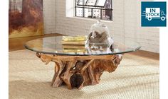 a wooden table with glass top in a room