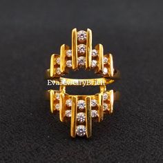 two gold rings with white diamonds on black surface, one is open and the other is closed