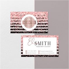 two business cards with pink and black stripes