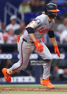 a baseball player is running to first base during a game against the giants on may 22,