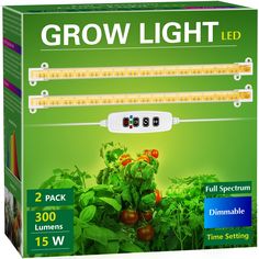 the grow light is on display in front of a box with tomatoes and other vegetables