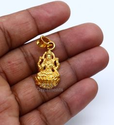 925 sterling silver handmade custom design vintage antique style Indian Hindu Goddess Laxmi pendant, this is special leaf Ganesh design pendant, best wishes blessing gift for your special person, excellent jewelry from India. Metal-925 sterling silver. Item type-Pendant. Length-3.8 centimeters. Width-1.5 centimeters. Weight-4.250 grams. Stamped-925. Finish-Gold polished over 925 silver Make excellent gifting and collectible pieces(gift for birthday, wedding, anniversary, mother's day, fathers da Laxmi Dollar Gold, Laxmi Gold Pendant, Lakshmi Devi Pendants Gold Small, 22k Gold Jewelry For Festivals Gift, 22k Gold Temple Jewelry As A Gift, 22k Gold Temple Jewelry Gift, 22k Gold Temple Jewelry For Gifts, 22k Gold Pendant Jewelry For Diwali, Handmade Pendant Jewelry For Diwali