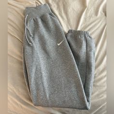 Brand New Super Soft Oversized And High Rise Never Worn Tracksuit Bottoms Nike, Nike Casual Sweatpants For Lounging, Casual Nike Sweatpants For Lounging, Nike Athleisure Bottoms For Lounging, Nike Gray Pants For Loungewear, Nike Gray Loungewear Pants, Gray Nike Sweatpants, Vintage Nike Sweatpants, Grey Nike Sweatpants