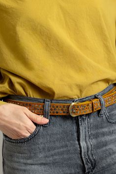 Genuine Leather 1" Wide Belt - Adjustable 42" length Features burnished Brass buckle and details Made in Morocco Motif56 artisanal belts are 100% genuine leather, designed in Brooklyn NY and handmade in Morocco. They are inspired by their artisan’s masterful and heritage craftsmanship, which along with their innovative design and rich textures makes their belts beautiful and recognizable. They produce elevated belts for people who appreciate their unique blend of polished and artisanal. Gold Embroidered Leather Belt, Vintage Leather Embroidered Belt, Artisan Leather Belt Buckle With Antique Design, Luxury Embroidered Brown Belts, Burnished Brass, Brass Buckle, Wide Belt, Rich Textures, Innovative Design