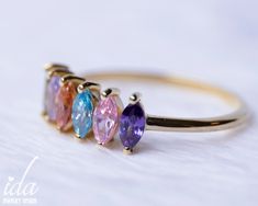 Birthstone mothers ring with your desired birthstones. A unique personalized gift for mom, for grandma ♡ It is also available with 1-2-3-4-5-6-7 or 8 stones. Please let me know if you are interested. ★ PRODUCT DETAILS; *Band Width: 1.3mm *Gemstone Size: 3mm*5mm for each stone. *Material Options: 925k Sterling Silver & Rose Gold Filled Over Silver & Yellow Gold Filled Over Silver *Birthstone Options: You can see the birthstone chart in the last photo of the listing. ★ HOW TO PLACE YOUR OR Heirloom Multicolor Jewelry For Gifts, Oval Stackable Birthstone Ring For Gifts, Heirloom Style Stackable Birthstone Ring As Gift, Adjustable Multicolor Birthstone Ring For Gifting, Adjustable Multicolor Birthstone Ring For Gift, Adjustable Multicolor Birthstone Ring As A Gift, Multicolor Multi-stone Birthstone Ring For Gift, Multicolor Gemstone Birthstone Ring For Gift, Multicolor Multi-stone Birthstone Ring As Gift