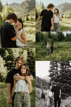 two people are standing in the grass with trees and mountains behind them