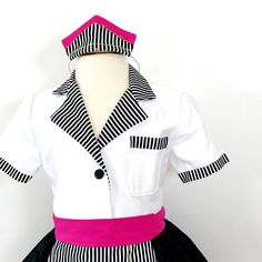 a white shirt with black and pink stripes on the collar, short sleeves, and skirt