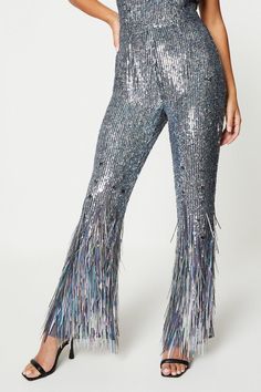 Prepare to make a lasting impression at your upcoming party with our stunning sequin jumpsuit. The shimmering sequins will catch the light and make you sparkle all night long. The jumpsuit design is both comfortable and flattering, hugging your curves in all the right places. Whether you're hitting the club or attending a formal event, this jumpsuit is sure to make a statement. Don't miss out on this show-stopping piece. Pants Romper Outfit, Pant Romper Outfit, Jumpsuit Design, Pants Romper, Embellished Jumpsuit, Evening Jumpsuit, Sequin Pants, Sequin Jumpsuit, Designer Jumpsuits