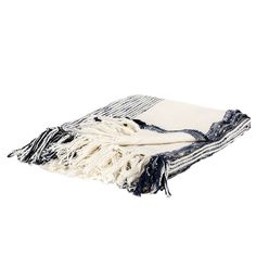 a white and blue striped blanket folded on top of each other with fringes around the edges