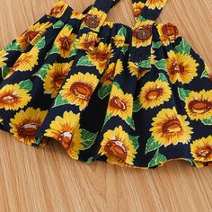 * Thickness: Regular * Season: Summer * Material: Cotton,Polyester * Wash Label: On the inside Cute Cotton Skirt With Floral Print, Cute Skirted Summer Dresses, Pinafore Skirt, Boutique Wholesale, Suspender Skirt, Sunflower Pattern, Sunflower Print, Printed Tank Tops, Print Tank