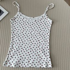 48730127106216 Cute Summer Tops With Tank Straps, Cute Summer Tank Top, Fitted Casual Floral Print Tank Top, Casual Printed Spring Vest, Cute Spring Tops With Tank Straps, Cute Tank Top For Spring, Cute Tank Strap Tops For Spring, Fitted Floral Print Sleeveless Vest, Cute Cotton Sleeveless Camisole