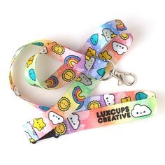 "This cute lanyard has a sturdy thumb clasp to hold keys, badges and more! Features a safety breakaway clasp making these great for school, work and conferences. Details: - 0.75\" wide - 18\" long (36\" end to end when open) - Silver tone thumb clasp - Vivid dye sublimation - Double sided print - Made of silky polyester - Breakaway safety clip at neck - Ships in a protective bubble mailer - Illustrated by Libby Johnston Napier Don't forget to add some of our enamel pins to your cart to complete School Lanyard, Saving Account, Cute Lanyard, Rainbow Badge, Cute Lanyards, School Badges, Badge Lanyard, Dinosaur Gifts, Promotional Design