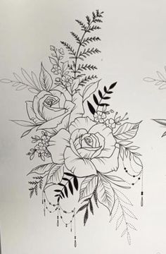 a drawing of flowers and leaves on a sheet of white paper with black ink in it