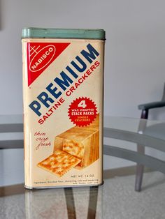 a box of salted crackers sitting on top of a glass table