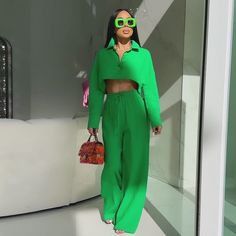 Infuse your wardrobe with a splash of color with our Vibrant Leisure Two-Piece Set, available in eye-catching green and vivid orange. Each set is designed for the woman who dares to stand out and enjoys the blend of comfort and contemporary style. Make a bold statement while embracing the ease of a coordinated ensemble. Key Features: • Bold Colors: Choose between the lush green and the electric orange sets to suit your mood or occasion. • Relaxed Fit: The soft fabric ensures a comfortable fit, perfect for a day in or a casual outing. • Versatile Styling: Pair it with sneakers for an athleisure look or with heels for an evening out. • Crop Top & High-Waisted Pants: The stylish crop top and high-waisted pants flatter any figure, giving you a chic silhouette. Sizes: Available in women’s sizes Chic Green Long Sleeve Sets, Green Long Sleeve Sets For Day Out, Green Fitted Sets For Day Out, Green Spring Loungewear Sets, Trendy Green Fitted Sets, Trendy Green Long Sleeve Sets, Trendy Fitted Green Sets, Chic Green Sets For Day Out, Chic Green Sets For A Day Out