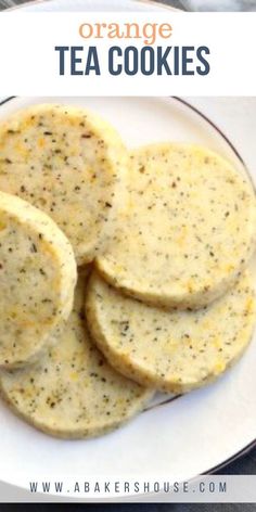 orange tea cookies on a white plate with text overlay that says orange tea cookies