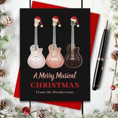 christmas card with three guitars on it and the words merry musical christmas from the hendersons