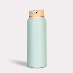 a light blue water bottle with an orange cap on the top and bottom, sitting in front of a white background