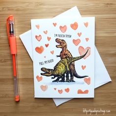 a card with an image of a t - rex on it and hearts in the background