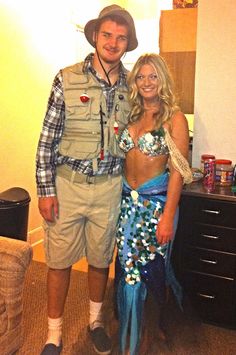 a man and woman dressed up in costumes