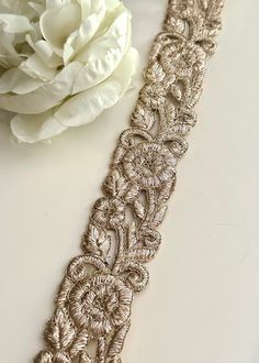 Introducing you to the fabulous Hand Embroidered Gold Mirror Work Border. It's a real gem! Picture this: intricate mirror-work delicately embroidered by hand. A border that exudes style and elegance. Get ready to dazzle and make a statement with this beautiful creation. Trust me, you'll be turning heads and receiving compliments left and right! So go ahead, and let your creativity shine with this amazing gold mirror-work border. We are constantly adding new items, and you'll find our complete in Gold Trims With Embroidered Border For Party, Elegant Gold Embroidered Bridal Belt, Elegant Gold Dupatta With Embroidered Border, Gold Embroidered Trims For Wedding, Gold Embroidered Wedding Trims, Traditional Gold Embroidered Fabric With Lace Work, Gold Dupatta With Embroidered Border For Party, Gold Embroidered Fabric For Party With Embroidered Border, Gold Embroidered Fabric With Border For Party