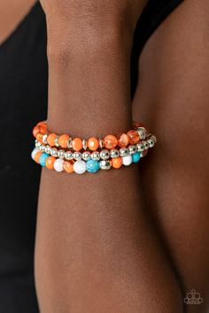 Infused with shimmery silver accents, a collection of glassy and acrylic, blue, orange, and white beads are threaded along stretchy bands around the wrist, creating colorful layers.

 Sold as one set of three bracelets. Multi Necklace, Blue Orange White, Paparazzi Accessories, Stretchy Bracelets, Paparazzi Jewelry, Affordable Jewelry, One Set, Silver Accents, White Beads