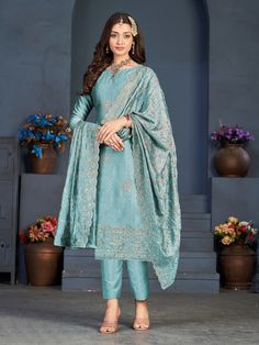 COLOR : Light Blue FABRIC : Top - Blooming Vichitra Silk, Bottom - Dull Santoon, Dupatta - Blooming Vichitra Silk WORK : Resham Embroidery, Zari, Sequins, Stones, Lace BorderOCCASION : Engagement, Party Wear, Festival READY-TO-WEAR : No STITCHING : Available as semi-stitched fabric, can be stitched using standard size option (+$20). Note: There might be a slight color variation due to lighting and flash used during photoshoot. The bright shade seen is the best closer view of fabric's color. Designer Churidar, Churidar Dress, Silk Pant Suit, Churidar Suits, Salwar Kameez Online, Pakistani Salwar Kameez, Designer Salwar Suits, Festive Wear, Pant Suit