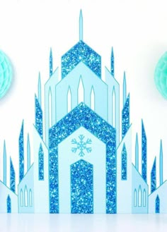 a paper cut out of a church with snowflakes on it