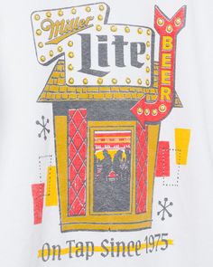 a white t - shirt with the words miller lite on it