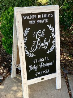 a chalkboard sign for a baby shower