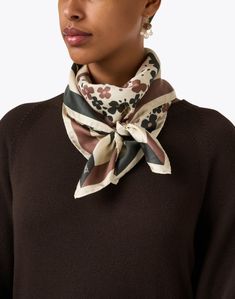 Ines de la Fressange has mastered the art of modern femininity, and this floral printed scarf is no exception. Luxuriously crafted from 100% silk, it is sure to tie together all your favorite looks. We love it knotted at the neck or on the strap of a bag for a subtle yet chic touch. Chic Floral Print Scarf For Gifts, Chic Floral Print Scarf As Gift, Chic Floral Print Scarf For Gift, Designer Silk Scarf For Spring, Luxury Silk Scarves With Floral Print, Luxury Silk Floral Print Scarves, Elegant Multicolor Scarf, Elegant Beige Silk Scarf With Floral Print, Chic Brown Silk Scarf For Spring