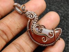 You will receive One Carnelian Moon Pendant Wire Wrapped copper pendant Gemstone Healing Jewelry Filigree Art Wire Wrap Pendant Necklace For Her Beautiful gift . Pendant Size: 43 mm long include bail. Many thanks for you visit my store ♥ if you have any question please contact us. For wholesale Price Please Convo me. You can order different items as many you like . Unique Crescent Shaped Copper Jewelry, Copper Moon Charm For Jewelry Making, Orange Copper Wire Jewelry As A Gift, Orange Copper Wire Jewelry For Gifts, Bronze Moon Charm Jewelry Gift, Bronze Jewelry With Moon Charm Gift, Crescent Copper Jewelry As Gift, Copper Jewelry With Moon Charm For Gift, Crescent Copper Jewelry Gift