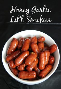 honey garlic little smokies in a white bowl on a black background with text overlay