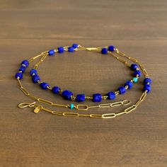 Opulently timeless, this sublime lapis and gold chain can be worn as a single strand, doubled up, or circled around the wrist as a wrap bracelet. 22k yellow gold Lapis 8mm x 7mm (1/4" x 1/4")Turquoise accents approx. 4mm (3/16") in diameterNecklace is 33.5" long Elegant Blue Necklace With Gold Chain, Elegant Blue Jewelry With Gold Chain, Elegant Lapis Lazuli Jewelry With Adjustable Chain, Luxury Gold Necklace With Lapis Lazuli, Elegant Lapis Lazuli Necklace With Adjustable Chain, Handmade Lapis Lazuli Yellow Gold Jewelry, Handmade Lapis Lazuli Jewelry In Yellow Gold, Handmade Yellow Gold Lapis Lazuli Jewelry, Handmade Yellow Gold Jewelry With Lapis Lazuli