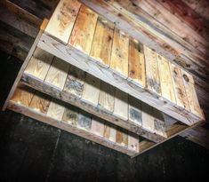 two wooden pallets stacked on top of each other