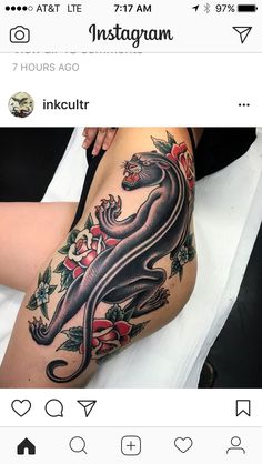 a woman's thigh with a tattoo on it and a black cat in the middle