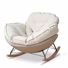 a rocking chair with a white cushion on it