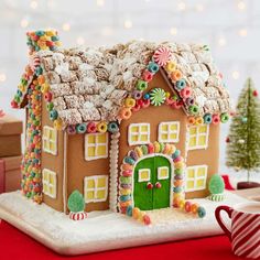 a gingerbread house decorated with candy and candies