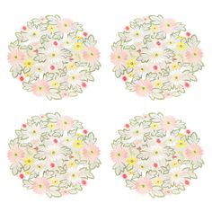 four plates with flowers and leaves on the top one has pink, yellow and white daisies