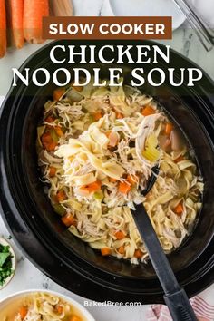 slow cooker chicken noodle soup in a crock pot with carrots and celery